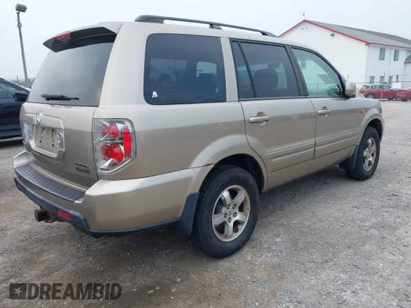 2006 Honda Pilot EX z VIN 2HKYF18416H501571, wystawiony jako IAAI lot #42902211 z przebiegiem 196 289 mil mil oraz . Historia ofert i sprzedaży dostępna na DreamBid. Obrazek 4.
