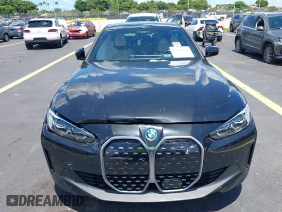 2023 BMW i4 eDrive35 with VIN WBY43AW02PFR45575, listed as a IAAI auction lot 42483868 with 14,076 mi miles and . Bid and sale history available at DreamBid. Image 12.