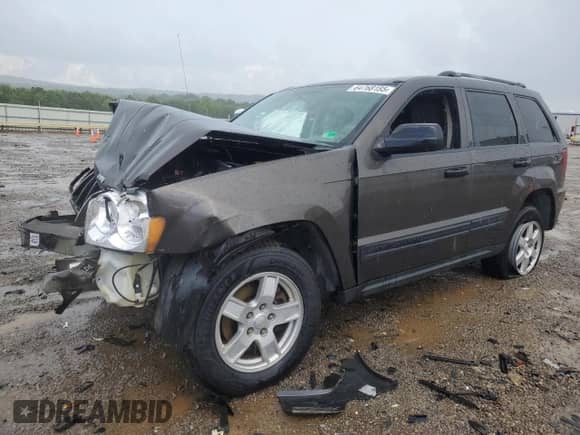 2005 Jeep Grand Cherokee Laredo with VIN 1J4GR48K25C715606, listed as a Copart auction lot 64768185 with 188,193 mi miles and Salvage title. Bid and sale history available at DreamBid. Image 1.