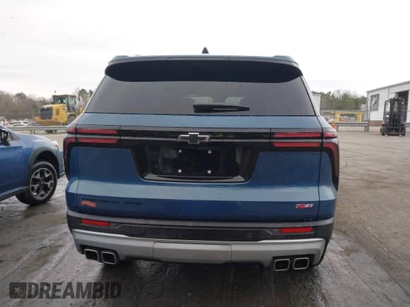 2024 Chevrolet Traverse AWD Z71 z VIN 1GNEVJKS7RJ197307, wystawiony jako IAAI lot #41505694 z przebiegiem 7 782 mil mil oraz . Historia ofert i sprzedaży dostępna na DreamBid. Obrazek 16.
