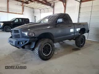 2004 Dodge 1500 ST with VIN 1D7HU16N44J199804, listed as a Copart auction lot 46985995 with 100,048 mi miles and Salvage title. Bid and sale history available at DreamBid. Image 1.