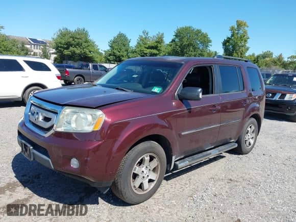 2009 Honda Pilot Touring with VIN 5FNYF48939B005946, listed as a IAAI auction lot 43178572 with 158,130 mi miles and . Bid and sale history available at DreamBid. Image 2.