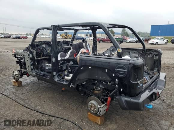 2024 Jeep Wrangler Rubicon с VIN 1C4RJXR65RW241826, выставлен на аукционе Copart как лот 81649975 с пробегом Не указан миль и Списание • Salvage title. История ставок и продаж доступна на DreamBid. Изображение 2.