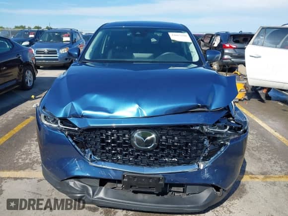 2023 Mazda CX-5 S Preferred z VIN JM3KFBCM8P0290216, wystawiony jako IAAI lot #43015320 z przebiegiem 22 704 mil mil oraz . Historia ofert i sprzedaży dostępna na DreamBid. Obrazek 12.