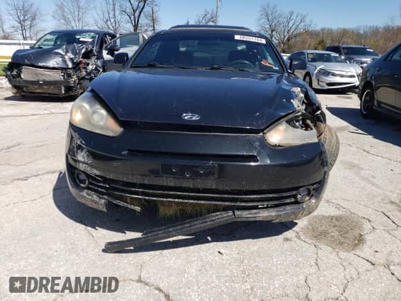 2008 Hyundai Tiburon GS с VIN KMHHM66D38U265788, выставлен на аукционе Copart как лот 48551184 с пробегом 166 754 миль миль и Списание • Salvage title. История ставок и продаж доступна на DreamBid. Изображение 5.