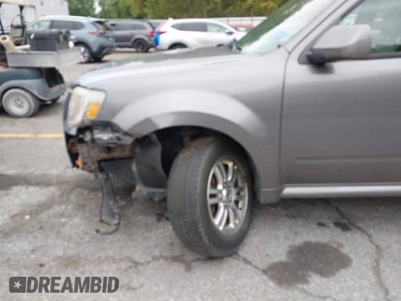 2010 Mercury Mariner Premier with VIN 4M2CN9H70AKJ30462, listed as a IAAI auction lot 43264181 with 169,789 mi miles and . Bid and sale history available at DreamBid. Image 6.