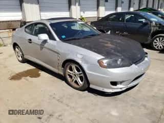 2006 Hyundai Tiburon GT с VIN KMHHN65F76U216025, выставлен на аукционе Copart как лот 74443474 с пробегом 139 626 миль миль и На запчасти • Non repairable. История ставок и продаж доступна на DreamBid. Изображение 1.