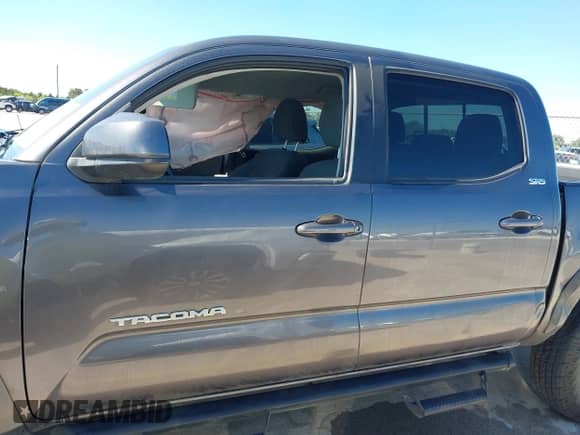 2021 Toyota Tacoma SR5 with VIN 5TFAZ5CN0MX106119, listed as a IAAI auction lot 42812735 with 70,968 mi miles and . Bid and sale history available at DreamBid. Image 14.