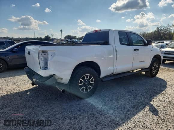 2010 Toyota Tundra with VIN 5TFRM5F17AX009408, listed as a Copart auction lot 89854185 with 137,897 mi miles and Salvage title. Bid and sale history available at DreamBid. Image 3.