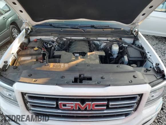 2018 GMC Sierra 1500 z VIN 1GTR1LEC3JZ341513, wystawiony jako Copart lot #77564244 z przebiegiem 56 873 mil mil oraz Szkoda całkowita • Salvage title. Historia ofert i sprzedaży dostępna na DreamBid. Obrazek 11.