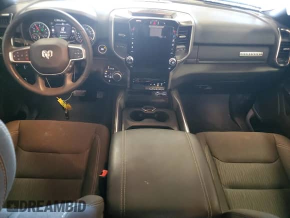 2024 Ram 1500 Big Horn with VIN 1C6RRFFG7RN141675, listed as a Copart auction lot 65241645 with 24,636 mi miles and Salvage title. Bid and sale history available at DreamBid. Image 8.