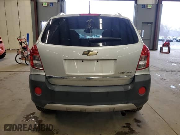 2014 Chevrolet Captiva Sport LS z VIN 3GNAL2EK0ES658605, wystawiony jako Copart lot #51807115 z przebiegiem 125 619 mil mil oraz Czysty tytuł • Clean title. Historia ofert i sprzedaży dostępna na DreamBid. Obrazek 6.