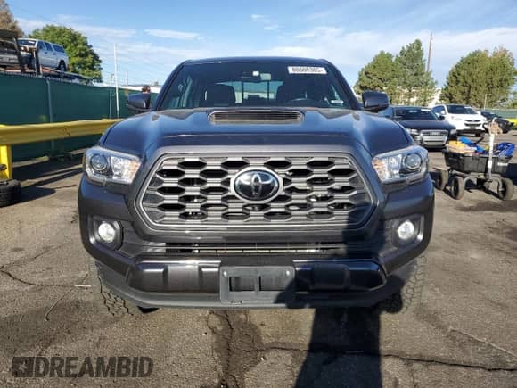2023 Toyota Tacoma SR with VIN 3TMCZ5ANXPM559511, listed as a Copart auction lot 80508385 with 33,176 mi miles and Salvage title. Bid and sale history available at DreamBid. Image 5.