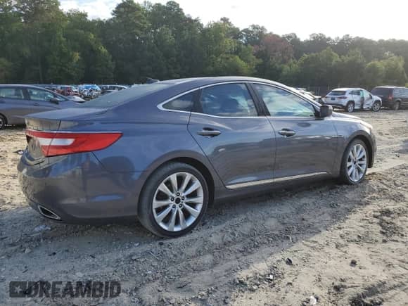 2013 Hyundai Azera с VIN KMHFH4JG7DA320448, выставлен на аукционе Copart как лот 71187445 с пробегом 97 432 миль миль и Списание • Salvage title. История ставок и продаж доступна на DreamBid. Изображение 3.