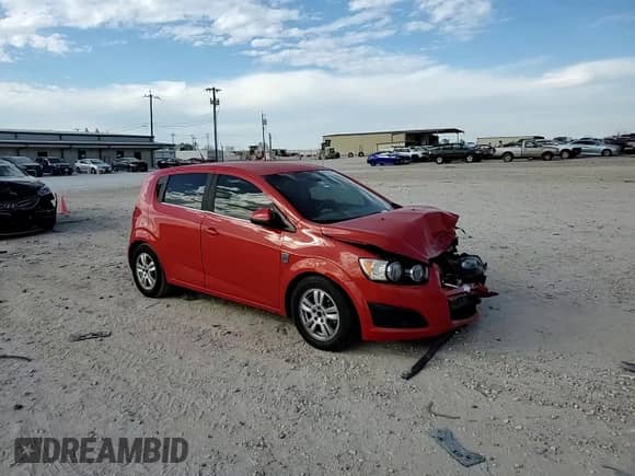 2012 Chevrolet Sonic LT z VIN 1G1JD6SHXC4125785, wystawiony jako Copart lot #89107785 z przebiegiem 118 059 mil mil oraz Szkoda całkowita • Salvage title. Historia ofert i sprzedaży dostępna na DreamBid. Obrazek 10.