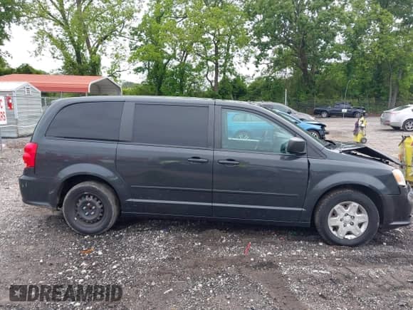 2012 Dodge Grand Caravan SE z VIN 2C4RDGBG2CR160230, wystawiony jako IAAI lot #42208654 z przebiegiem 140 726 mil mil oraz . Historia ofert i sprzedaży dostępna na DreamBid. Obrazek 13.