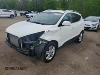 2012 Hyundai Tucson GLS z VIN KM8JU3AC5CU336187, wystawiony jako Copart lot #58704075 z przebiegiem 106 448 mil mil oraz Czysty tytuł • Clean title. Historia ofert i sprzedaży dostępna na DreamBid. Obrazek 1.