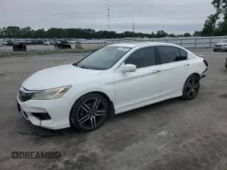 2017 Honda Accord Touring with VIN 1HGCR3F9XHA015798, listed as a Copart auction lot 57998695 with 205,023 mi miles and Salvage title. Bid and sale history available at DreamBid. Image 1.