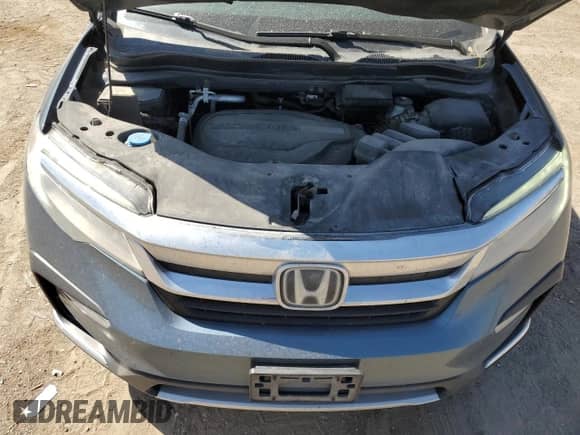 2020 Honda Pilot Elite z VIN 5FNYF6H05LB000171, wystawiony jako Copart lot #56385025 z przebiegiem 185 010 mil mil oraz Szkoda całkowita • Salvage title. Historia ofert i sprzedaży dostępna na DreamBid. Obrazek 12.