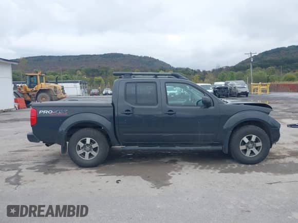 2011 Nissan Frontier Pro-4X with VIN 1N6AD0EVXBC449701, listed as a IAAI auction lot 43436699 with 223,651 mi miles and . Bid and sale history available at DreamBid. Image 13.