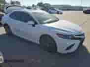 2018 Toyota Camry SE с VIN JTNB11HK3J3064126, выставлен на аукционе Copart как лот 82269945 с пробегом 88 446 миль миль и Списание • Salvage title. История ставок и продаж доступна на DreamBid. Изображение 4.