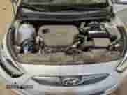 2014 Hyundai Accent GLS z VIN KMHCU4AE1EU588814, wystawiony jako Copart lot #80934265 z przebiegiem Nie podano mil oraz Szkoda całkowita • Salvage title. Historia ofert i sprzedaży dostępna na DreamBid. Obrazek 11.