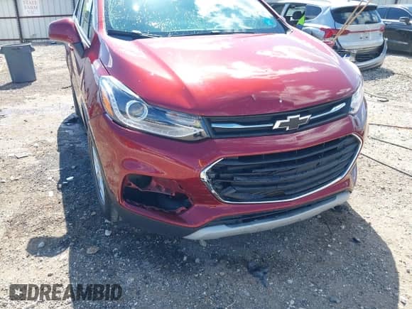 2021 Chevrolet Trax LT z VIN KL7CJLSB4MB314557, wystawiony jako IAAI lot #42377756 z przebiegiem 33 976 mil mil oraz . Historia ofert i sprzedaży dostępna na DreamBid. Obrazek 6.