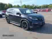 2021 Honda Pilot Special Edition with VIN 5FNYF6H22MB015925, listed as a IAAI auction lot 43332390 with 77,152 mi miles and . Bid and sale history available at DreamBid. Image 1.