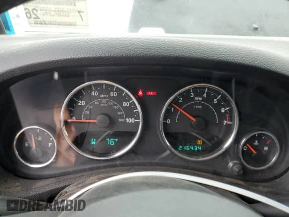 2012 Jeep Wrangler Sport z VIN 1C4AJWAG6CL228765, wystawiony jako Copart lot #80979855 z przebiegiem 216 434 mil mil oraz Szkoda całkowita • Salvage title. Historia ofert i sprzedaży dostępna na DreamBid. Obrazek 9.