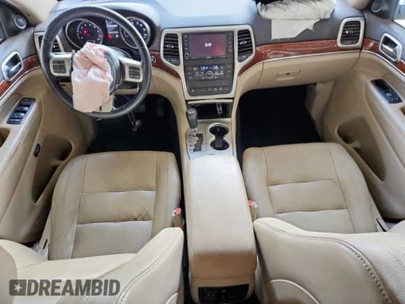 2012 Jeep Grand Cherokee Limited z VIN 1C4RJFBG0CC314672, wystawiony jako Copart lot #80743195 z przebiegiem 123 504 mil mil oraz Szkoda całkowita • Salvage title. Historia ofert i sprzedaży dostępna na DreamBid. Obrazek 8.