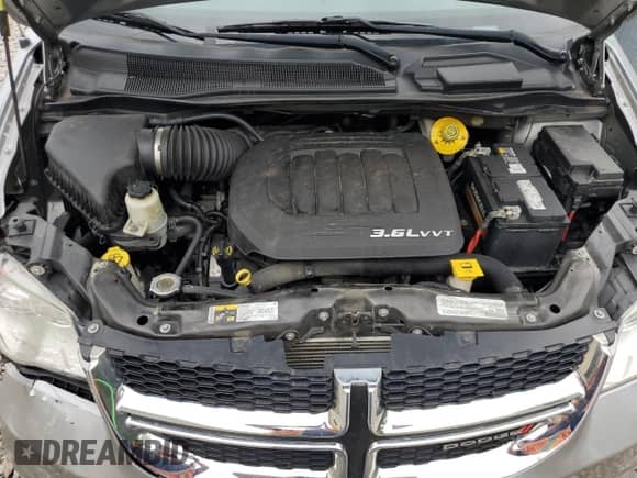2019 Dodge Grand Caravan SE Plus with VIN 2C4RDGBG4KR502193, listed as a Copart auction lot 69295335 with 162,636 mi miles and Salvage title. Bid and sale history available at DreamBid. Image 12.