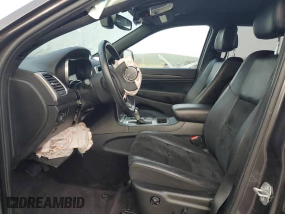 2018 Jeep Grand Cherokee Altitude with VIN 1C4RJEAG7JC339397, listed as a Copart auction lot 82102665 with 64,479 mi miles and Salvage title. Bid and sale history available at DreamBid. Image 7.