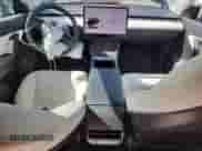 2021 Tesla Model Y Long Range with VIN 5YJYGDEE4MF130140, listed as a Copart auction lot 71863465 with 76,863 mi miles and Salvage title. Bid and sale history available at DreamBid. Image 8.