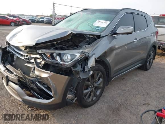 2018 Hyundai Santa Fe Ultimate с VIN 5NMZWDLAXJH100108, выставлен на аукционе IAAI как лот 42126768 с пробегом 68 325 миль миль и . История ставок и продаж доступна на DreamBid. Изображение 2.