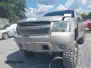 2007 Chevrolet Tahoe LTZ z VIN 1GNFC13J57R360258, wystawiony jako IAAI lot #43332129 z przebiegiem 188 980 mil mil oraz . Historia ofert i sprzedaży dostępna na DreamBid. Obrazek 6.