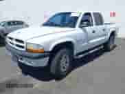 2002 Dodge Dakota Sport с VIN 1B7HG38N42S709487, выставлен на аукционе IAAI как лот 42820462 с пробегом 165 695 миль миль и . История ставок и продаж доступна на DreamBid. Изображение 2.