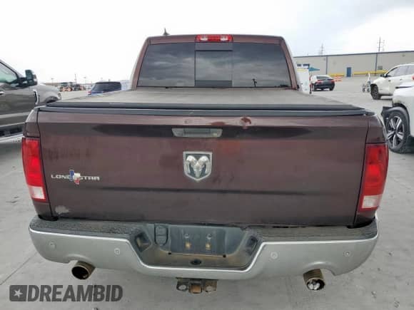 2015 Ram 1500 Outdoorsman with VIN 1C6RR6LT2FS512661, listed as a Copart auction lot 63101775 with 202,865 mi miles and Salvage title. Bid and sale history available at DreamBid. Image 6.