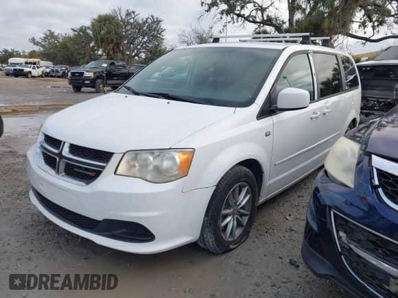 2014 Dodge Grand Caravan American Value with VIN 2C4RDGBG0ER372904, listed as a IAAI auction lot 41337878 with 108,511 mi miles and . Bid and sale history available at DreamBid. Image 2.