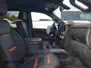 2021 GMC Sierra 1500 AT4 with VIN 3GTP9EEDXMG315144, listed as a IAAI auction lot 43338735 with 57,373 mi miles and . Bid and sale history available at DreamBid. Image 5.