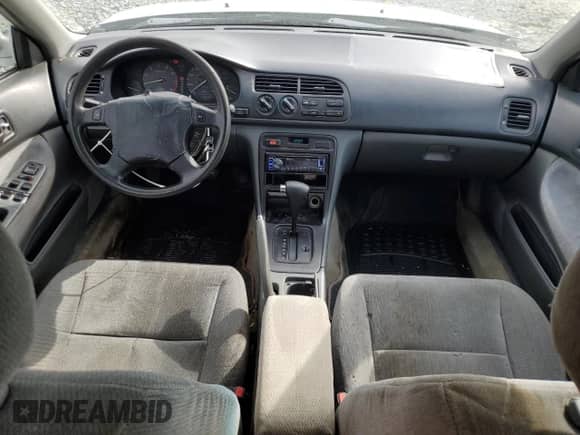 1994 Honda Accord LX с VIN 1HGCD5631RA175785, выставлен на аукционе Copart как лот 47111905 с пробегом 238 860 миль миль и Списание • Salvage title. История ставок и продаж доступна на DreamBid. Изображение 8.