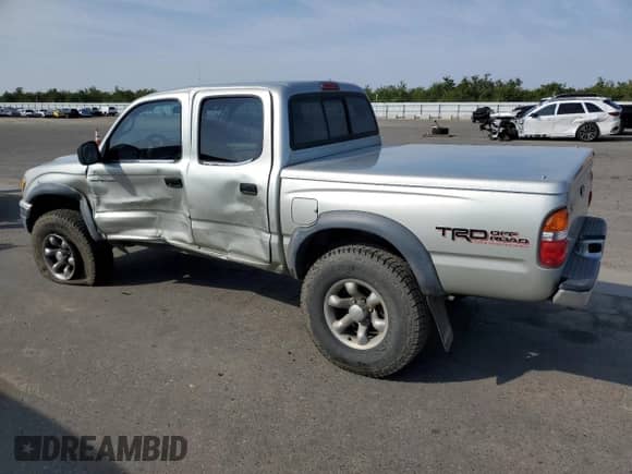 2002 Toyota Tacoma с VIN 5TEHN72N42Z117833, выставлен на аукционе Copart как лот 81821865 с пробегом 207 387 миль миль и Списание • Salvage title. История ставок и продаж доступна на DreamBid. Изображение 2.
