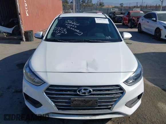 2020 Hyundai Accent SE with VIN 3KPC24A69LE121204, listed as a IAAI auction lot 43005962 with 7,015 mi miles and . Bid and sale history available at DreamBid. Image 12.