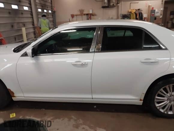 2013 Chrysler 300 with VIN 2C3CCARG6DH505220, listed as a IAAI auction lot 41944437 with 196,548 mi miles and . Bid and sale history available at DreamBid. Image 14.