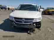 2014 Dodge Journey SXT with VIN 3C4PDCBG4ET296732, listed as a Copart auction lot 67479975 with 244,286 mi miles and Salvage title. Bid and sale history available at DreamBid. Image 5.
