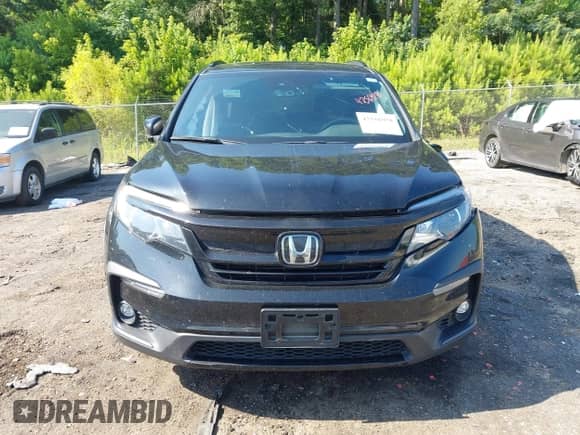 2022 Honda Pilot TrailSport with VIN 5FNYF6H84NB085965, listed as a IAAI auction lot 42556978 with 85,611 mi miles and . Bid and sale history available at DreamBid. Image 12.