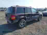 1996 Jeep Grand Cherokee Laredo z VIN 1J4GZ58S2TC262980, wystawiony jako IAAI lot #41949514 z przebiegiem 269 674 mil mil oraz . Historia ofert i sprzedaży dostępna na DreamBid. Obrazek 4.