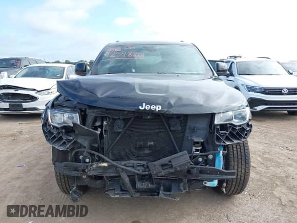 2020 Jeep Grand Cherokee Laredo E with VIN 1C4RJFAG0LC226447, listed as a IAAI auction lot 42598801 with 38,558 mi miles and . Bid and sale history available at DreamBid. Image 13.