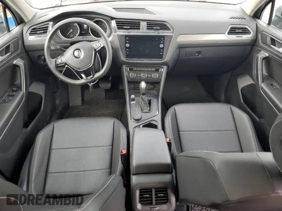 2021 Volkswagen Tiguan SE с VIN 3VV2B7AX7MM118770, выставлен на аукционе Copart как лот 82082155 с пробегом 80 787 миль миль и Списание • Salvage title. История ставок и продаж доступна на DreamBid. Изображение 8.