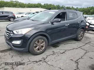 2016 Hyundai Santa Fe with VIN 5XYZUDLB0GG318558, listed as a Copart auction lot 69553145 with 137,494 mi miles and Salvage title. Bid and sale history available at DreamBid. Image 1.