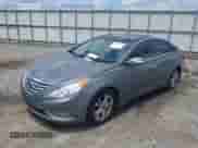 2013 Hyundai Sonata SE with VIN 5NPEC4AC9DH642318, listed as a IAAI auction lot 43009839 with 158,740 mi miles and . Bid and sale history available at DreamBid. Image 2.